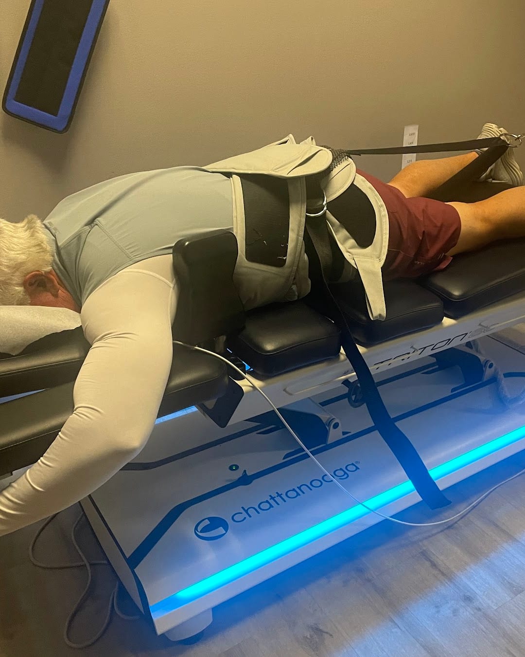 A patient on the spinal decompression table